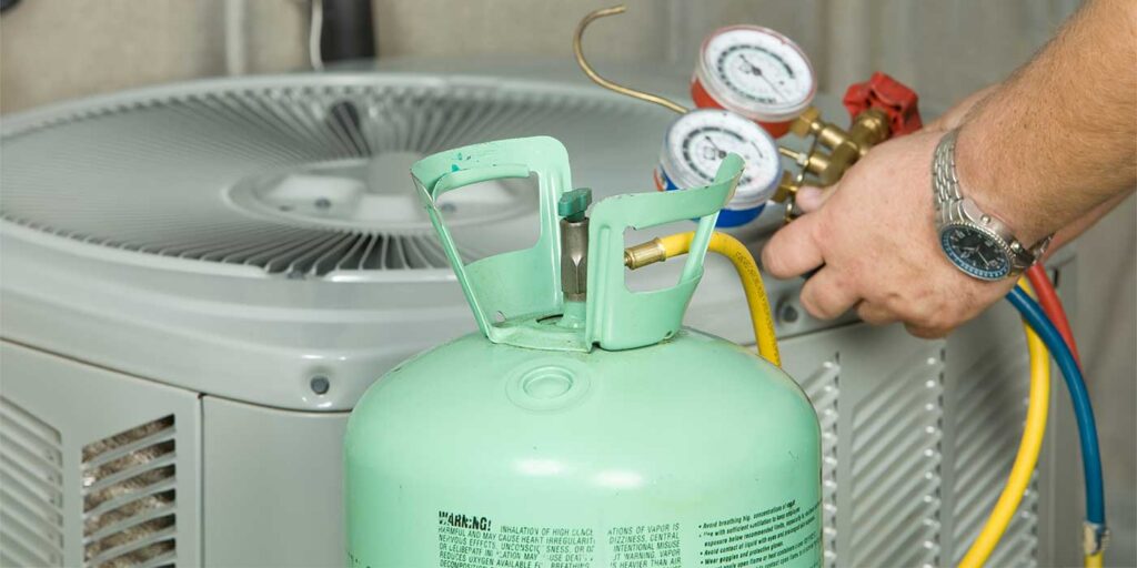 technician charging A2L refrigerant system